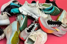 Running shoes are displayed from New Balance, Brooks, Nike, and Reebok